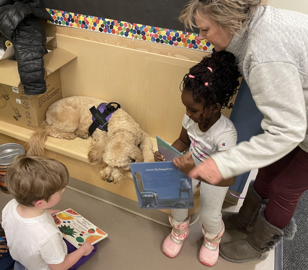 Kiko reads with KFS students