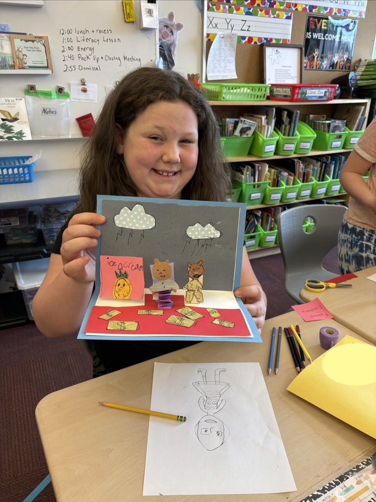 student showing off their pop-up page