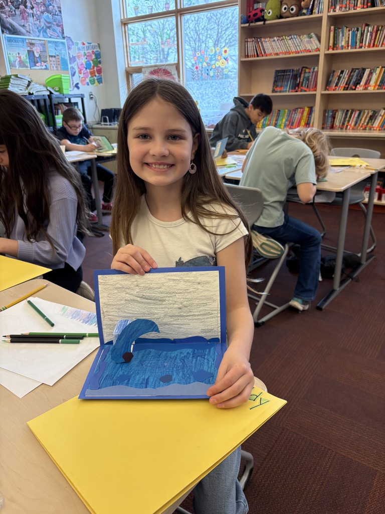 student showing off their pop-up page