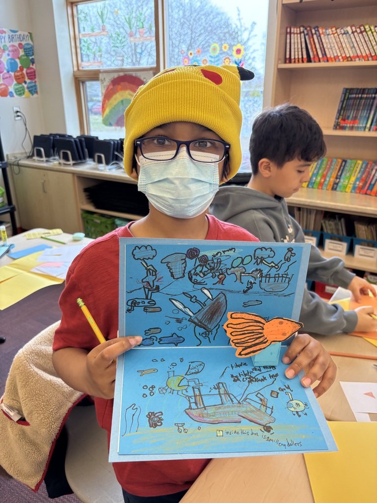 student showing off their pop-up page