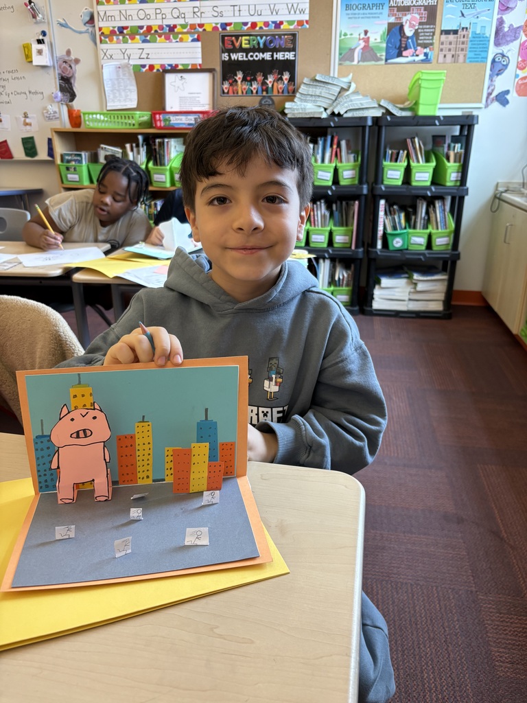 student showing off their pop-up page