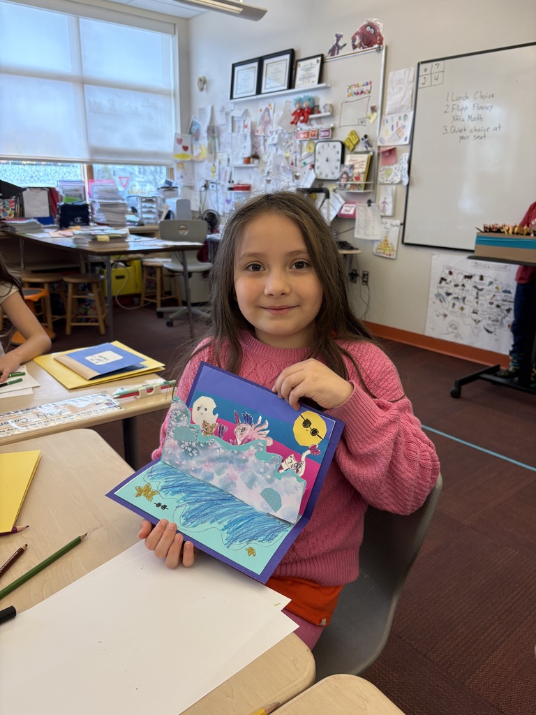 student showing off their pop-up page