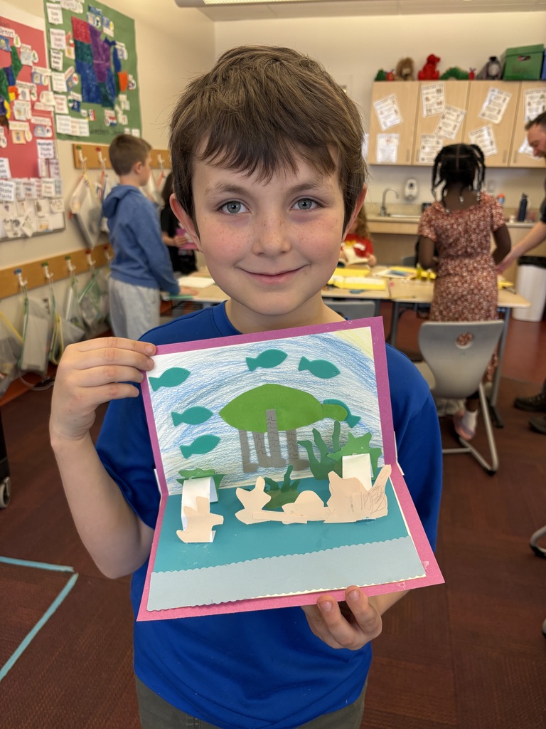 student showing off their pop-up page