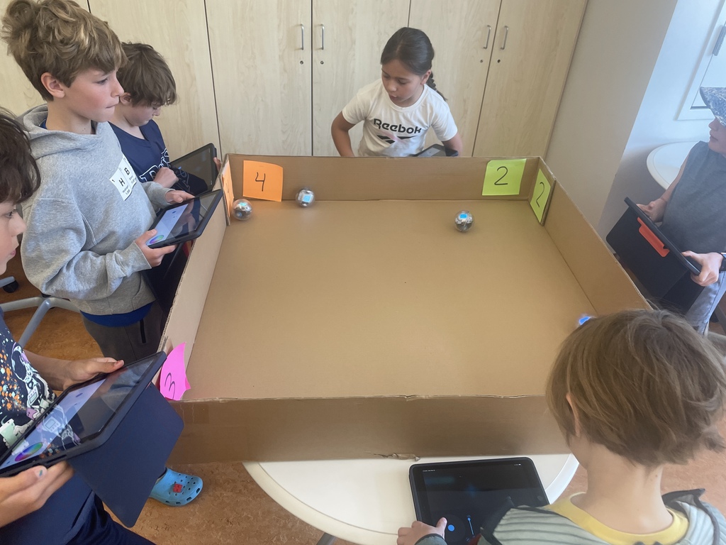 students playing four corners with Sphero Bolts