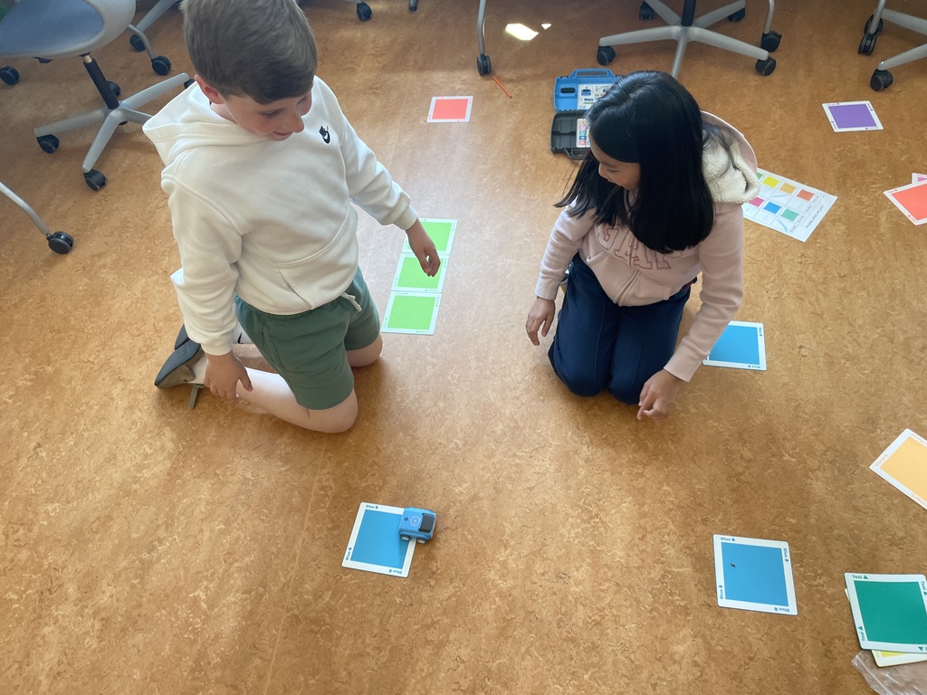 students working on coding the Sphero Indi
