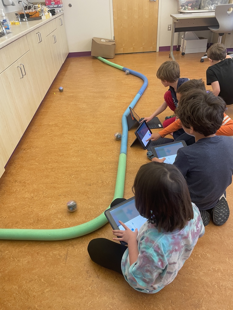 students racing Sphero Bolts