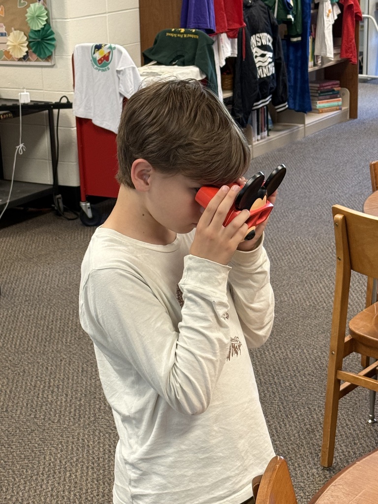 Student using a Mickey Mouse Viewfinder