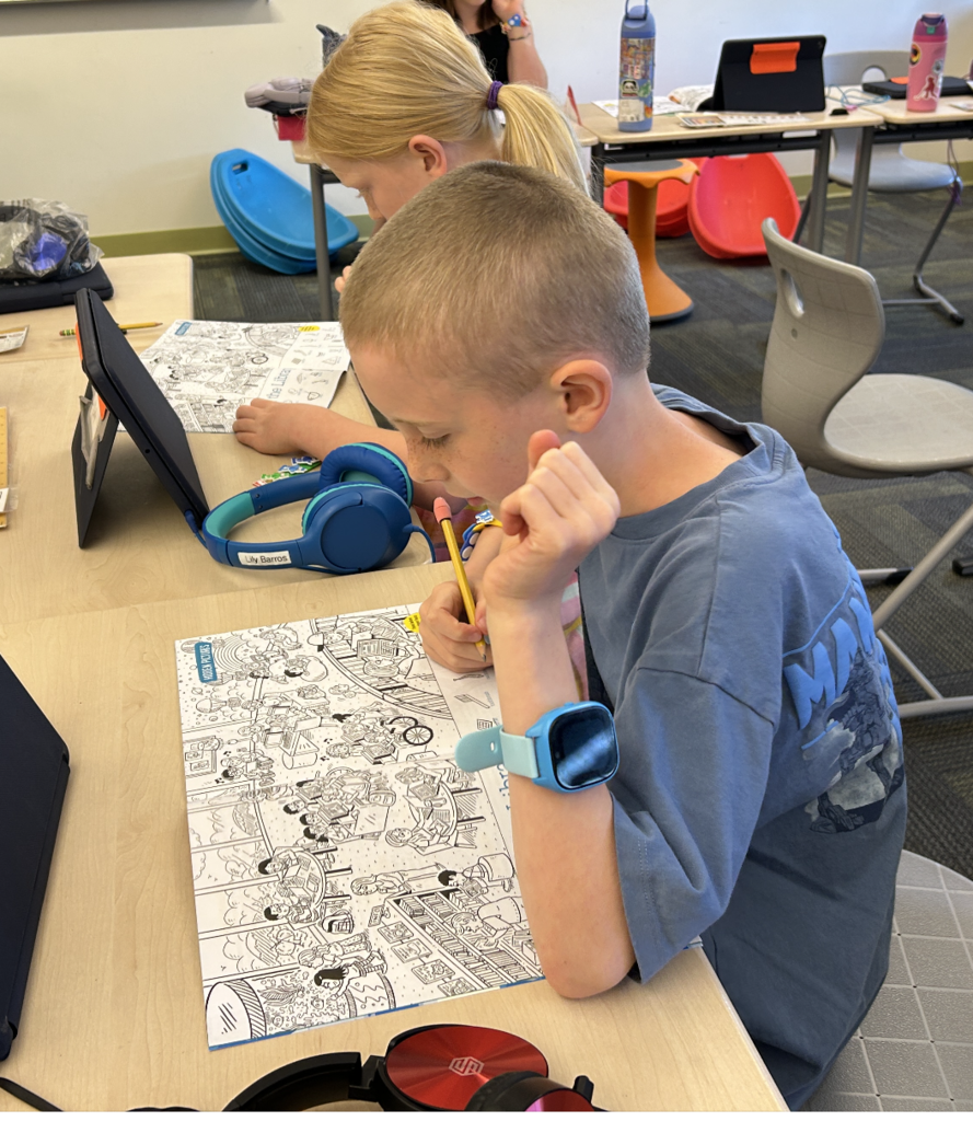 boy looking at his magazine