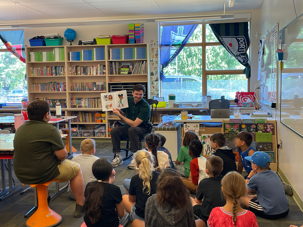 class of students being read to