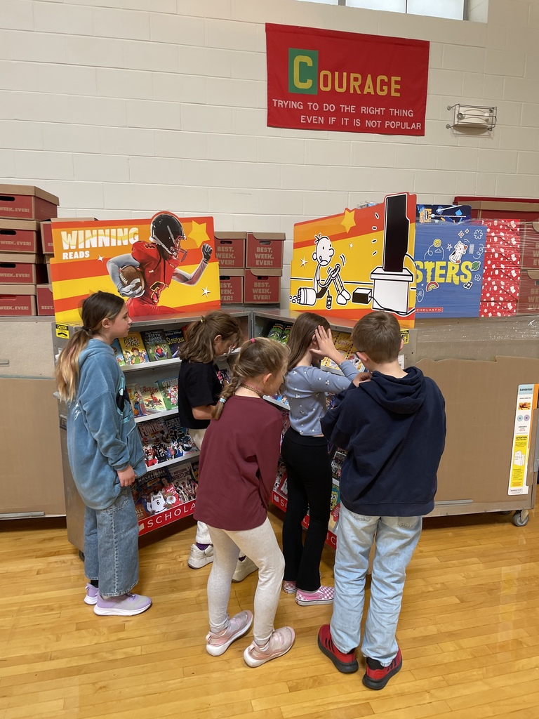 students excited to see what books will be at the upcoming book fair