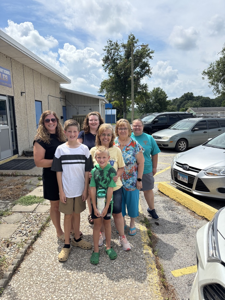Dr. Bitner, staff, and students. 