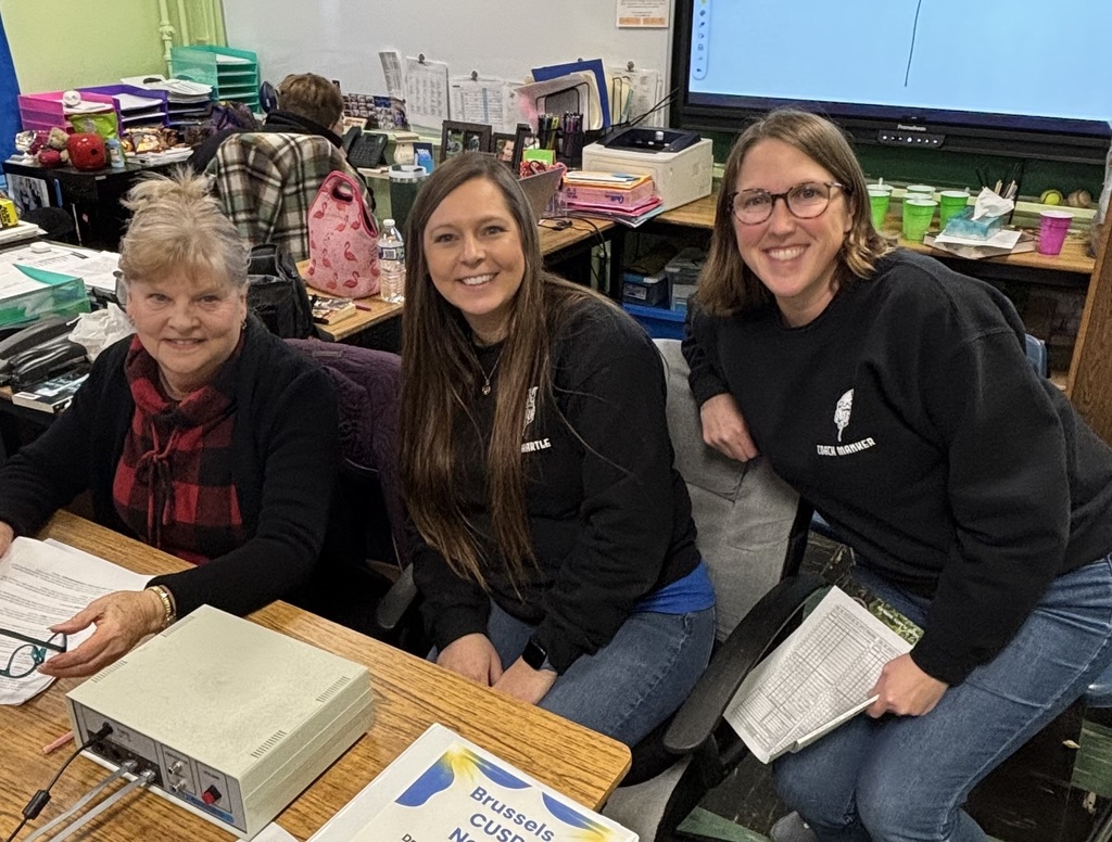 Questioner and Brussels High School Coaches