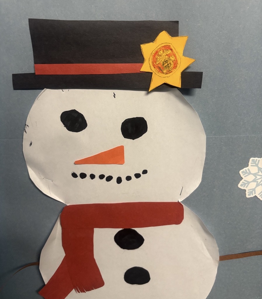 The star on the snowman.