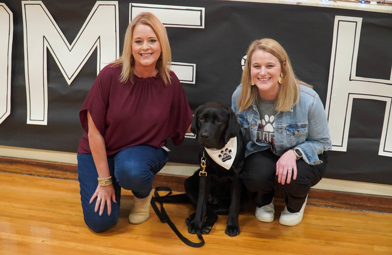 June, The Comfort Dog With Principal and Her Handler
