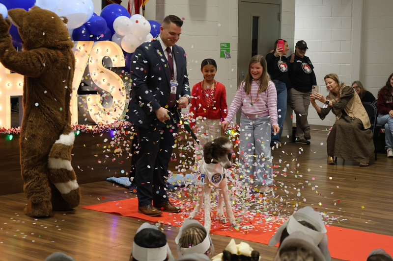 Rhys and Mr. Aaron Gneiding are sprinkled in magic dust.