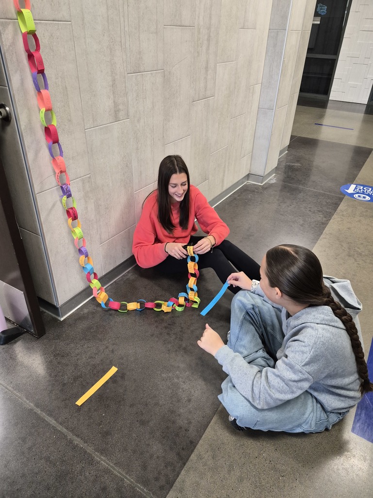 students working on the chain