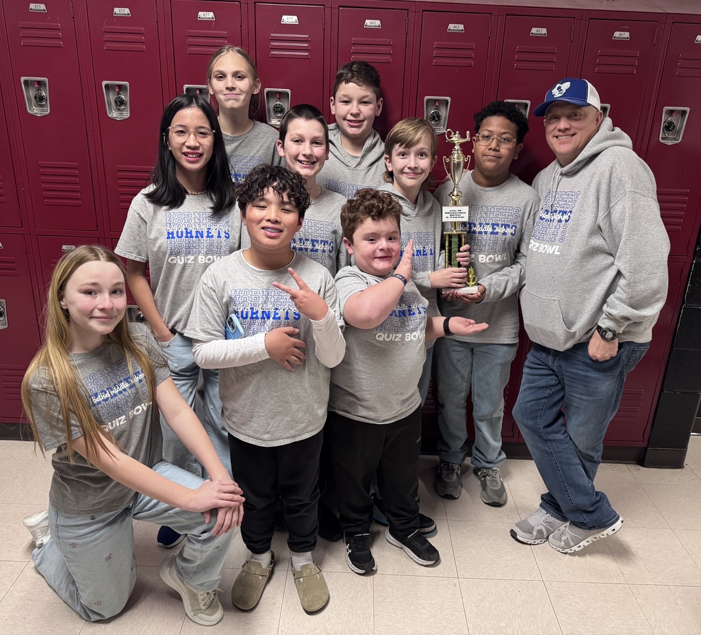 Quiz Bowl Team bringing home the win.