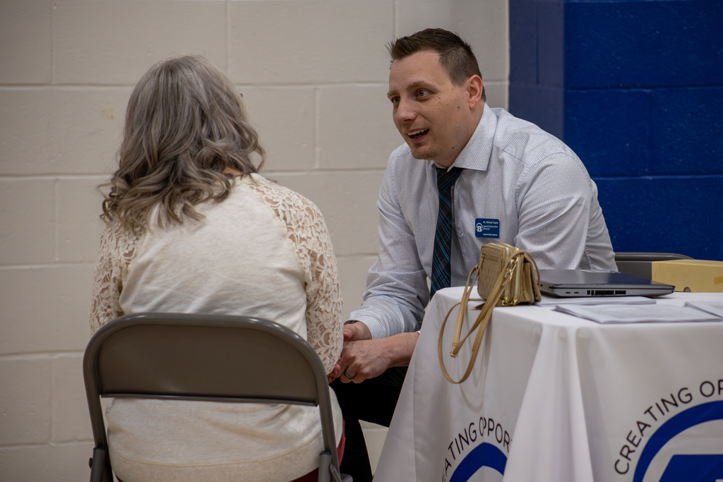 sitting down talking