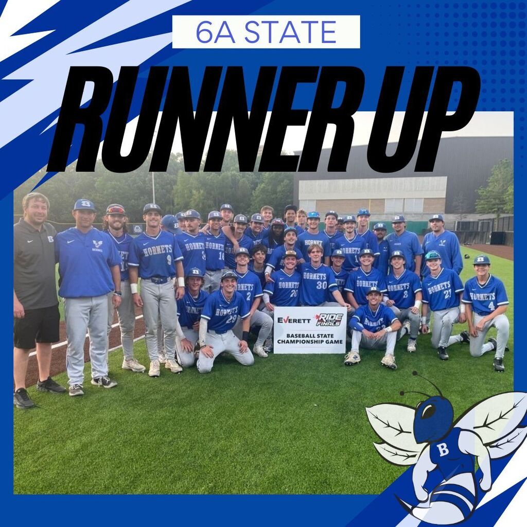 A sports team stands in blue uniforms on a field. A sign reads "Runner Up." A bee emblem is in the corner.