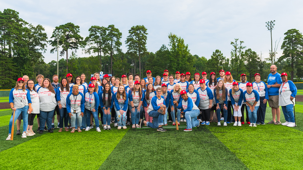 A picture of all Springhill Elementary Staff on the Bryant HS baseball field 