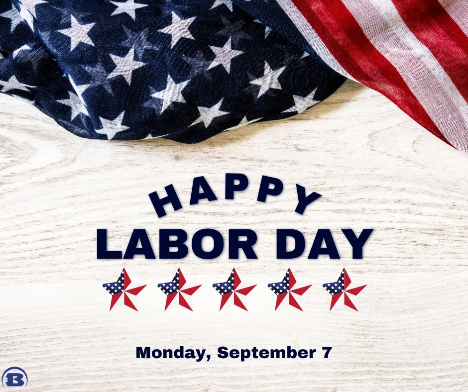 American flag partially folded over a wooden surface. Text reads "HAPPY LABOR DAY" with stars. Date reads "Monday, September 7".