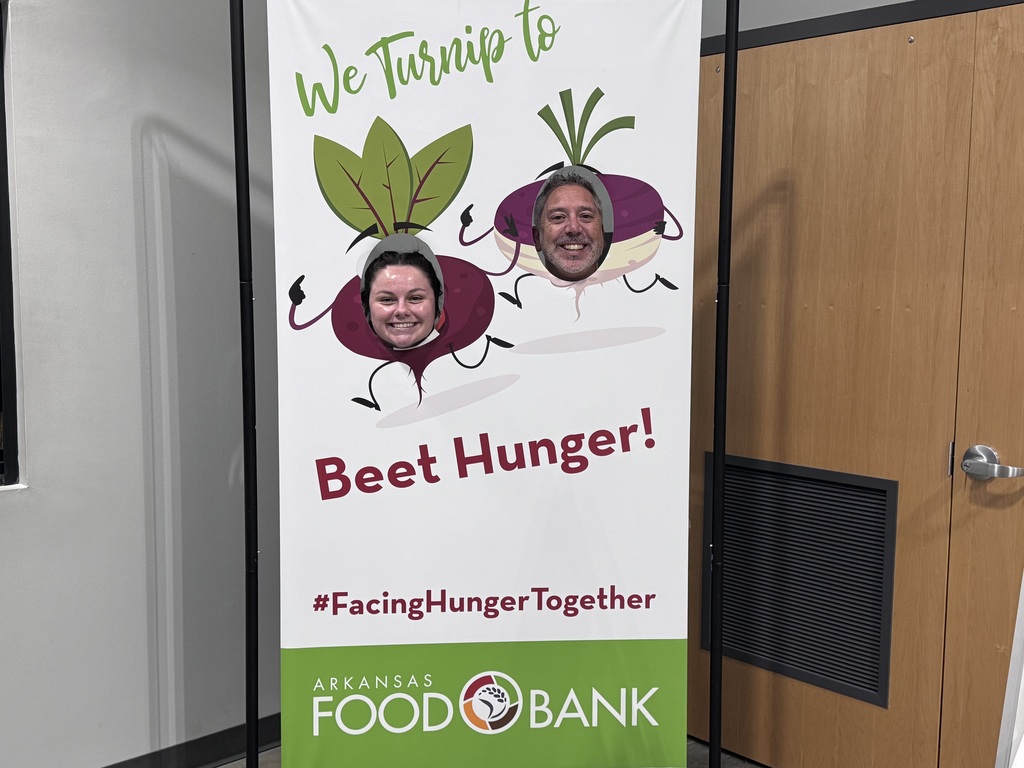 A banner with a green background shows two people wearing beet heads. It says "We Turnip to Beet Hunger!" and "#FacingHungerTogether."