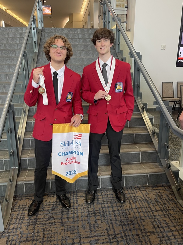 two students with their medals