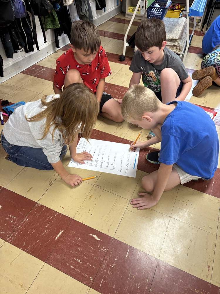 Third graders are learning to work in a group.