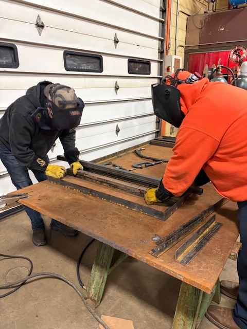 Welding Technology students are welding seat frames