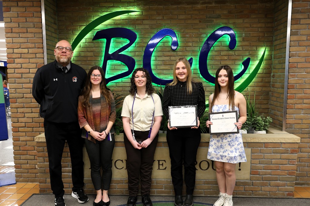 Newcomerstown with staff