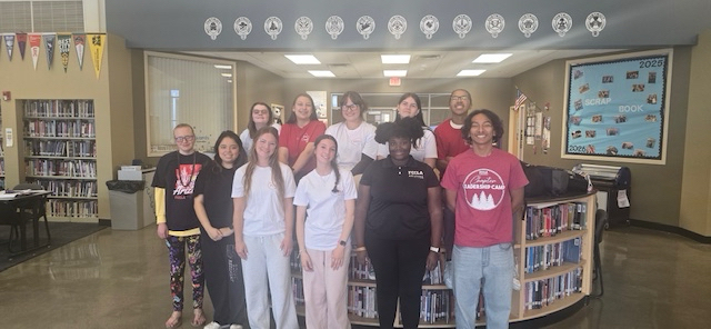 FCCLA Ed Pro group posing in the library