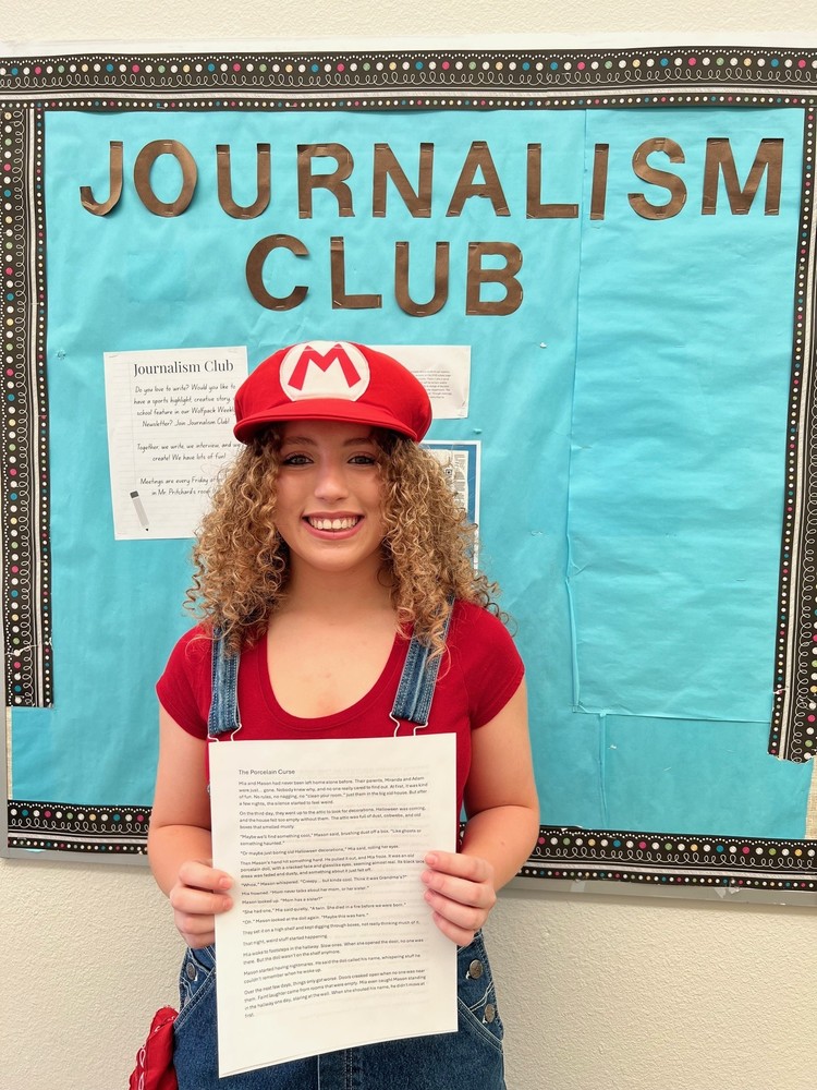 Elizabeth Irvin holds her winning short story