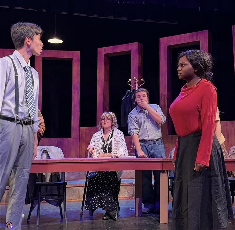 Student actors on stage