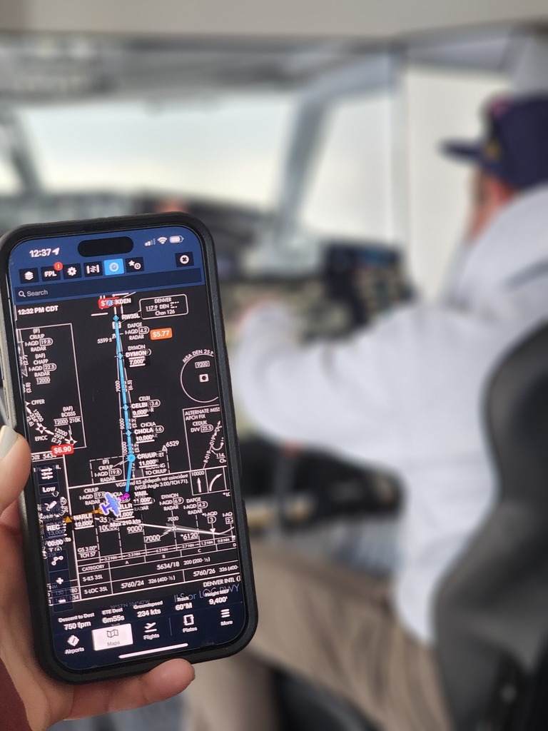 students utilizing flight simulator