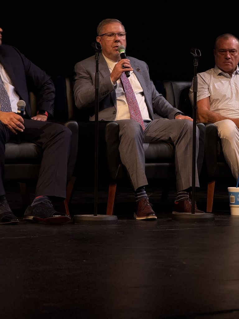 men posing in group photo