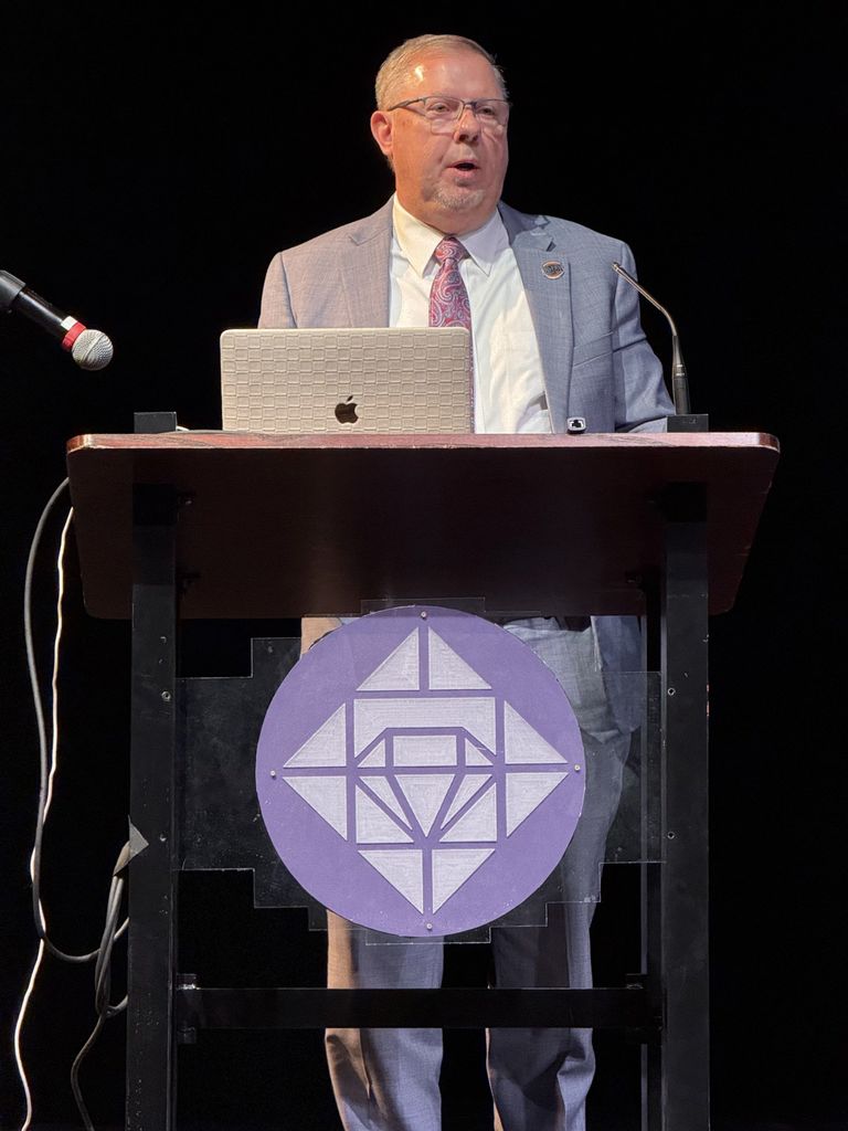 men posing in group photo