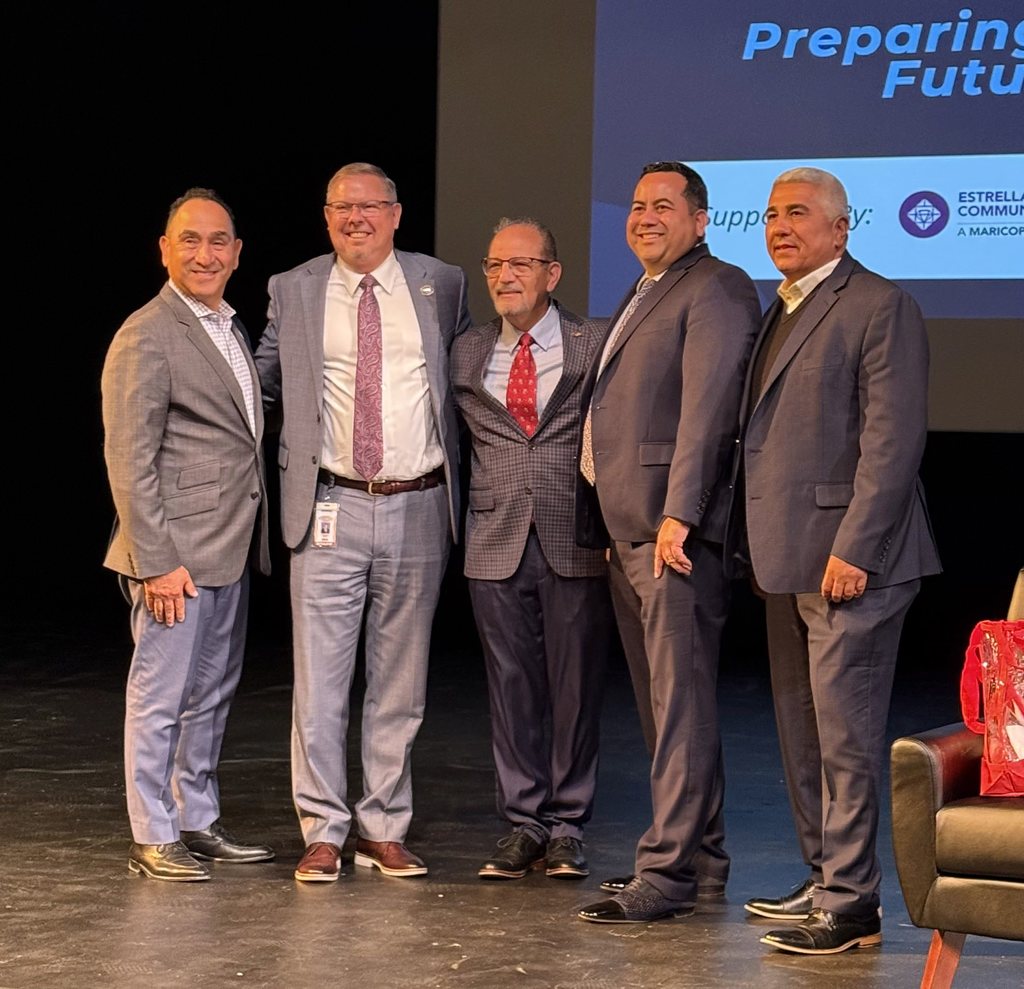men posing in group photo