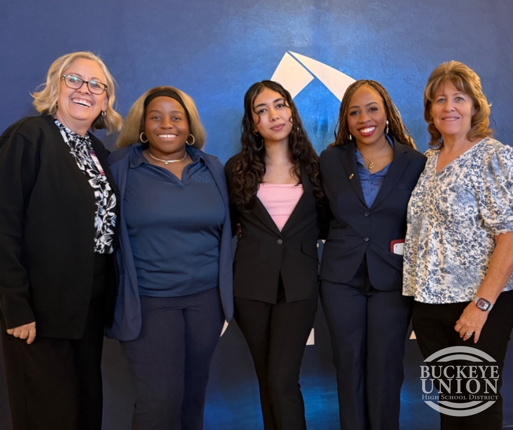 students and staff posing for photo
