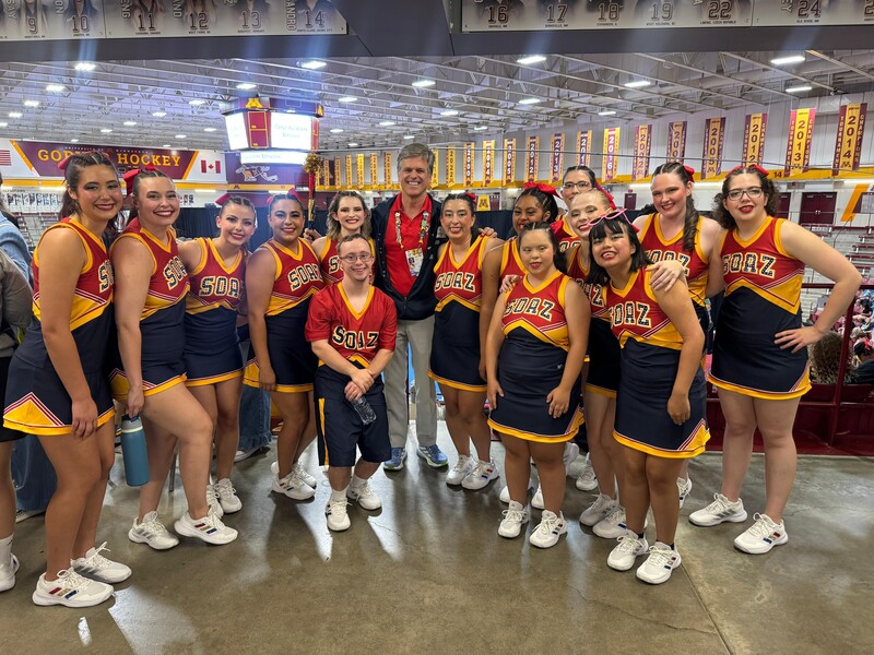 cheer team posing for a quick photo