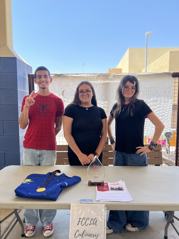 Students standing at FCCLA Culinary Table