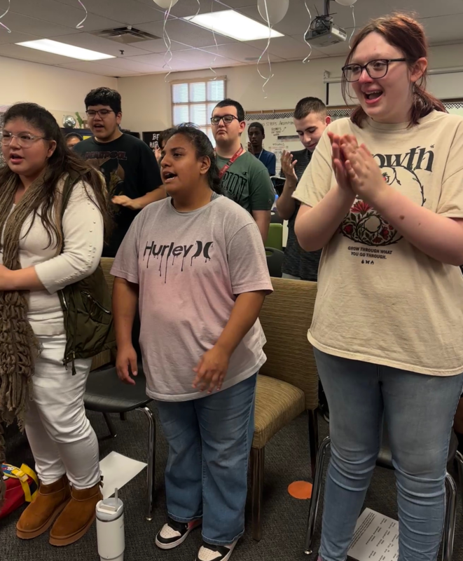Unified Choir students rehearsing in classroom