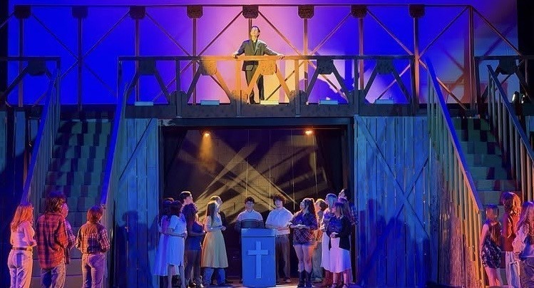 Students rehearsing for Footloose