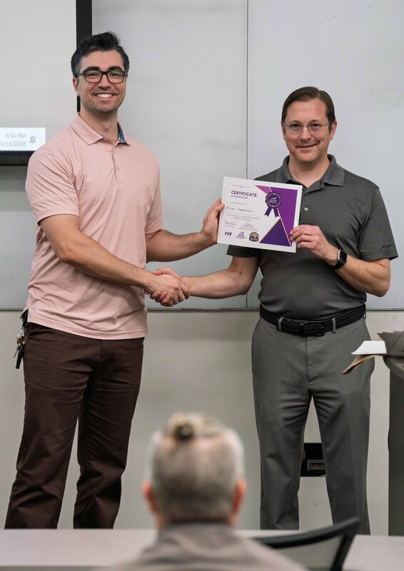 Mihai receiving his award