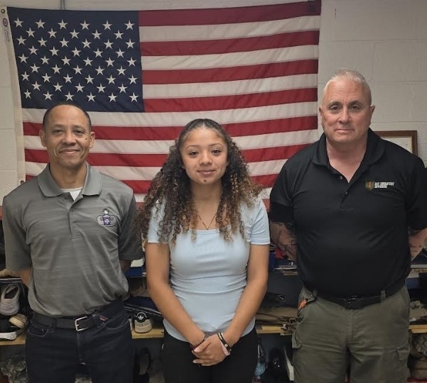 Maira Portillo with her JROTC Instructors Richie Pozo and Bruce Grazier