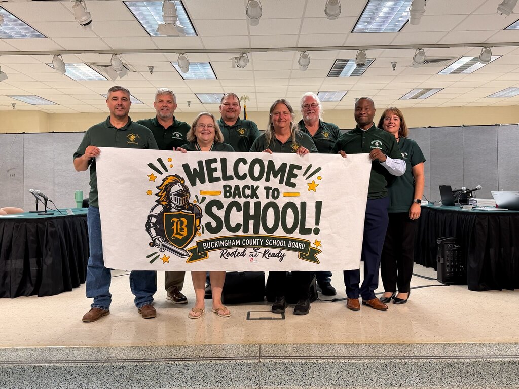 Buckingham County School Board Members with Superintendent holding a Welcome Back Sign