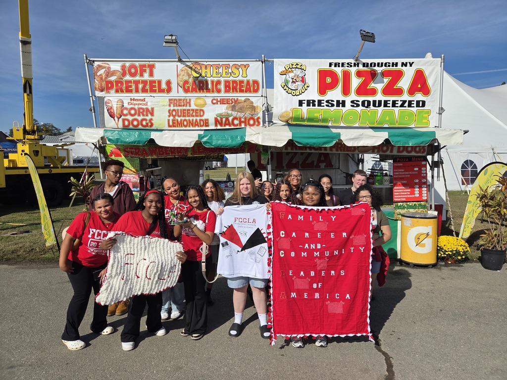 FCCLA Members pose with their projects on the fairway at the State Fair