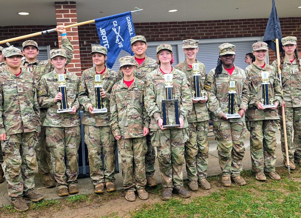 JROTC Lady Raiders qualify for the Best of Best Competition.  Lady Raiders with their trophies
