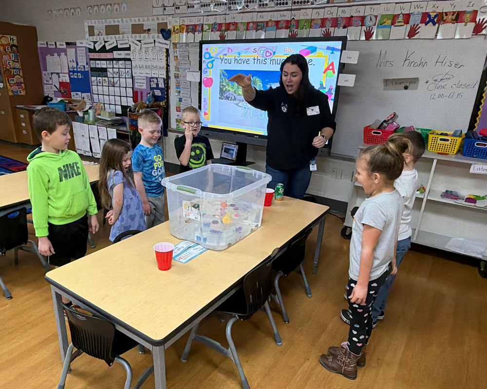 MTC Employee demonstrates skin or float with BES Kindergarteners