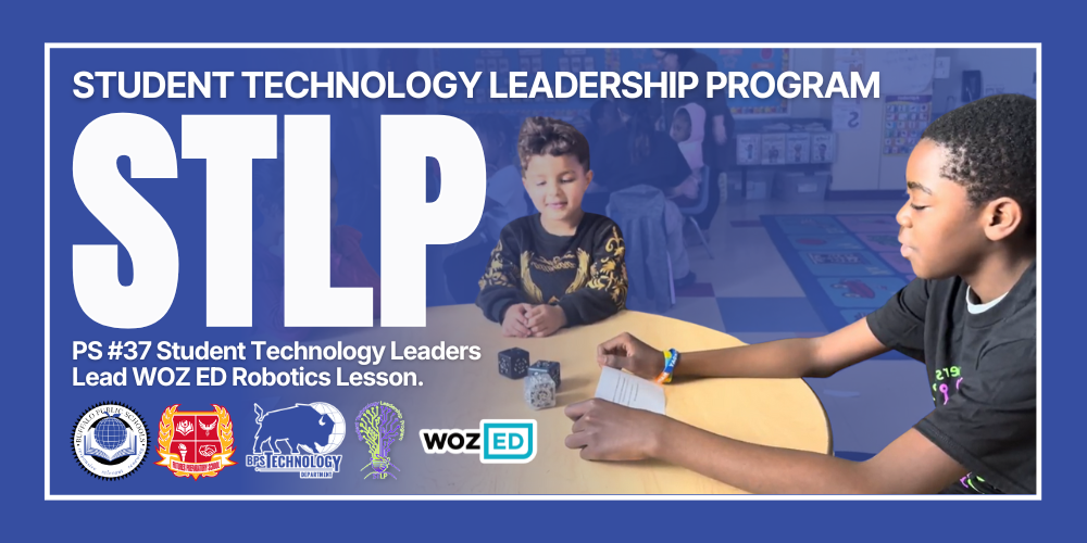 A picture of two students playing with Cubelet robots - STLP PS #37 Student Technology Leaders Lead WOZ ED Robotics Lesson. Student Technology Leadership Program