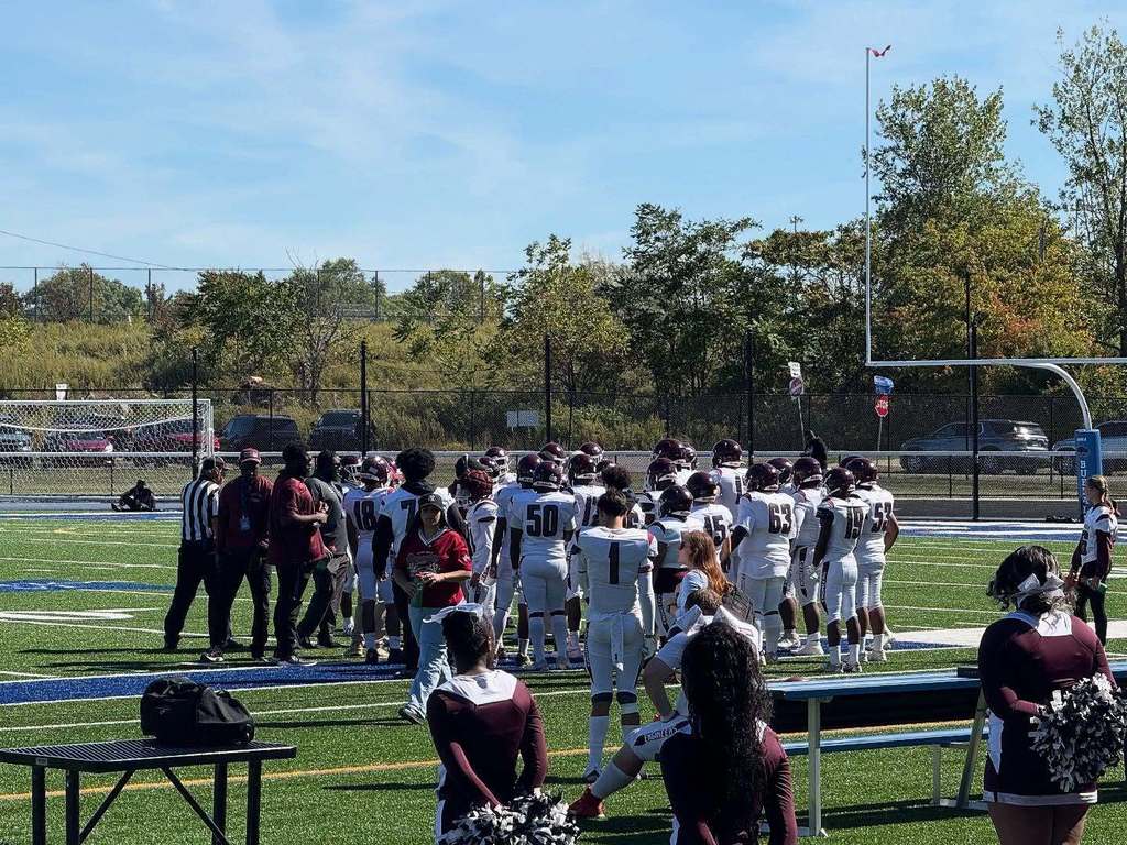 Football Team Huddle Before Game